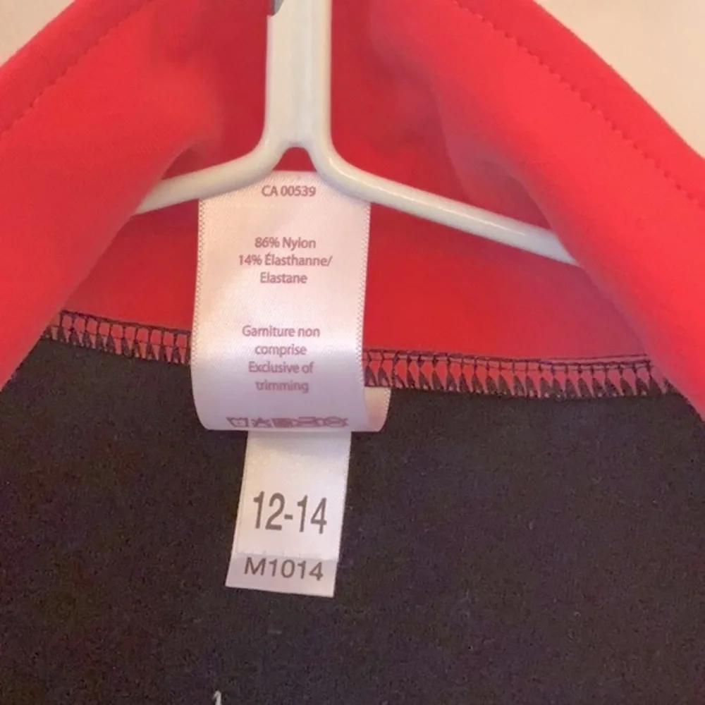 Mondor girls black and coral skating jacket in size 12 - 14